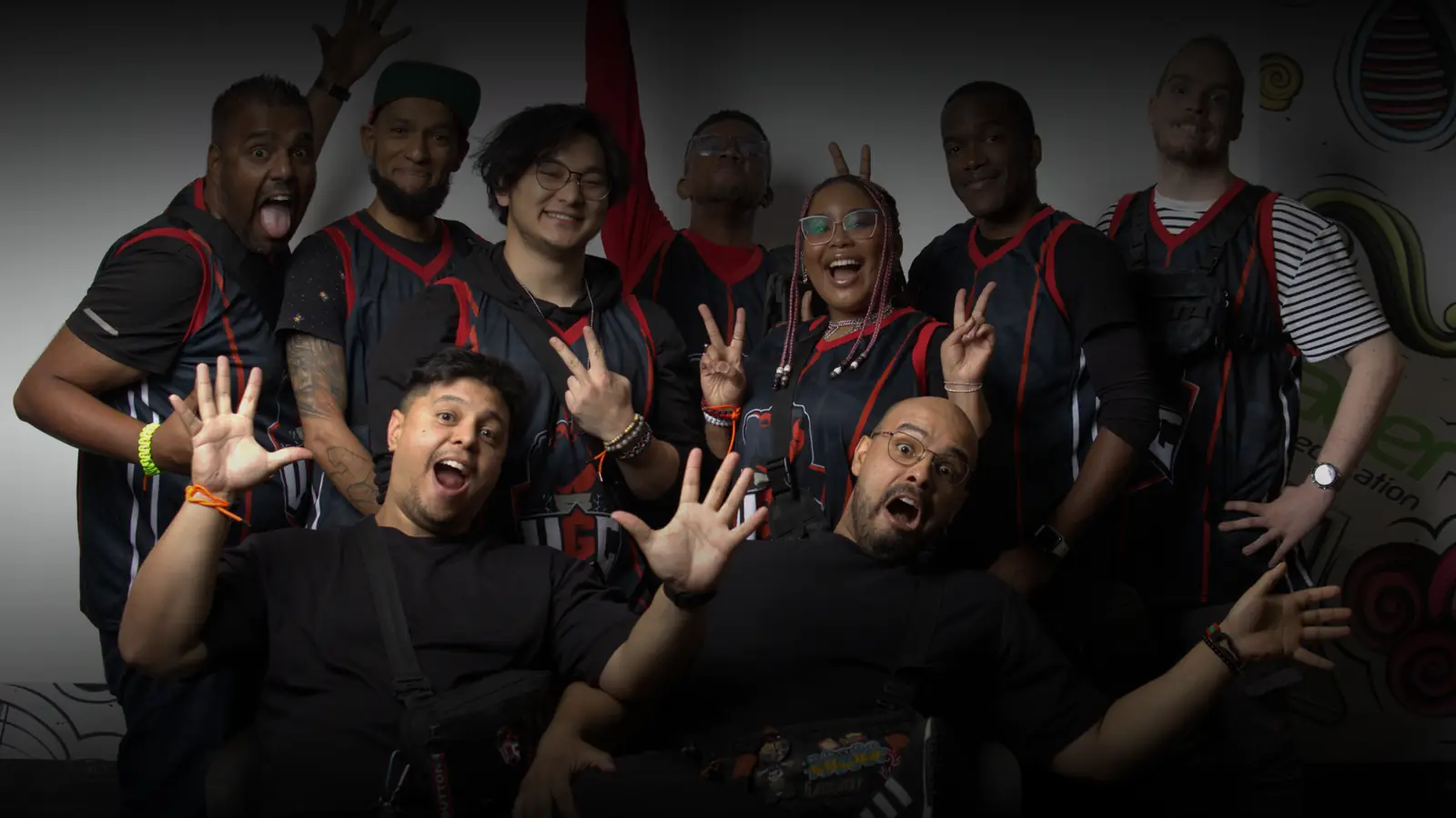 A team posing together in UGCZA event shirts.