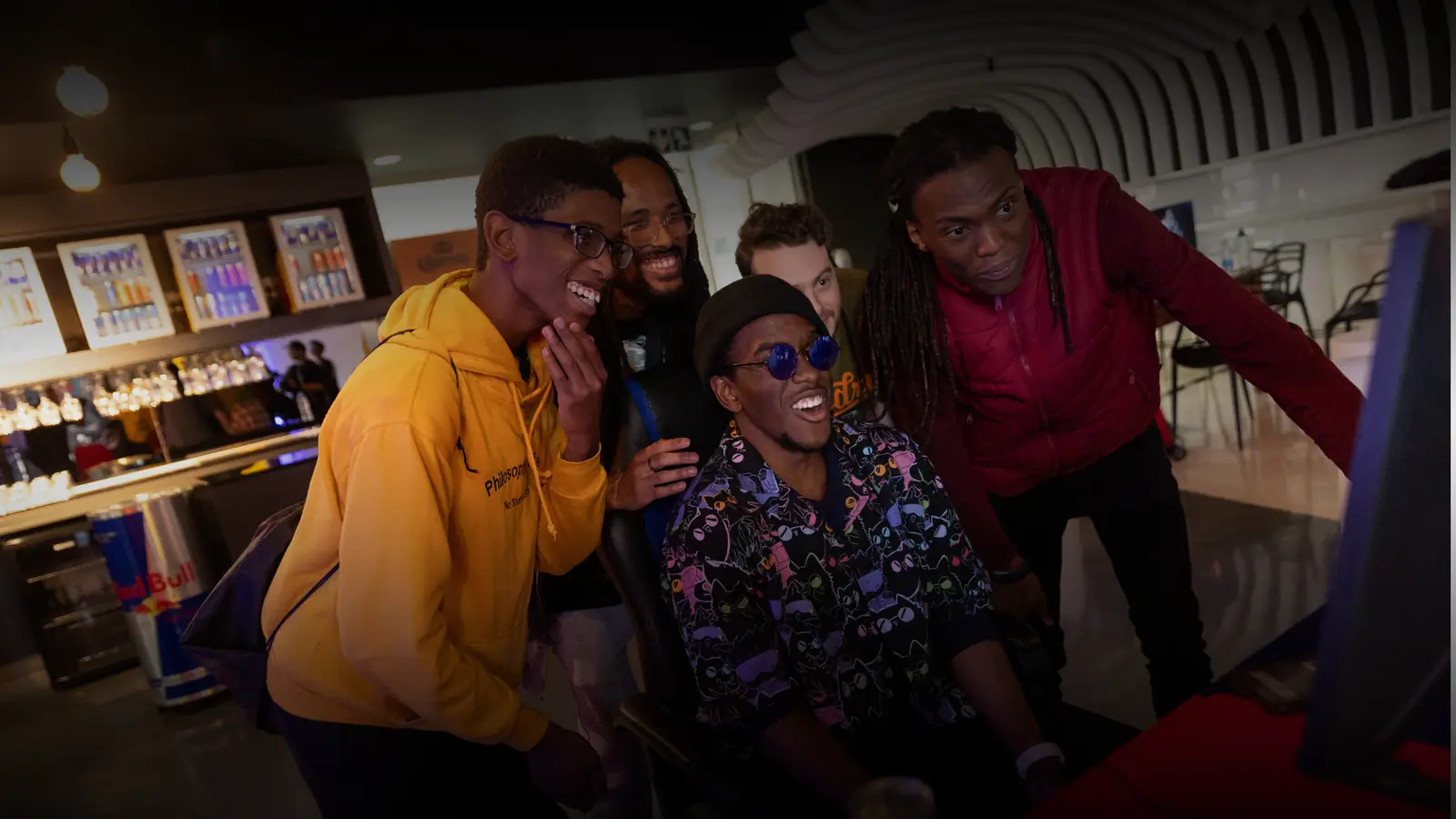 Attendees laughing together at a UGCZA event venue.